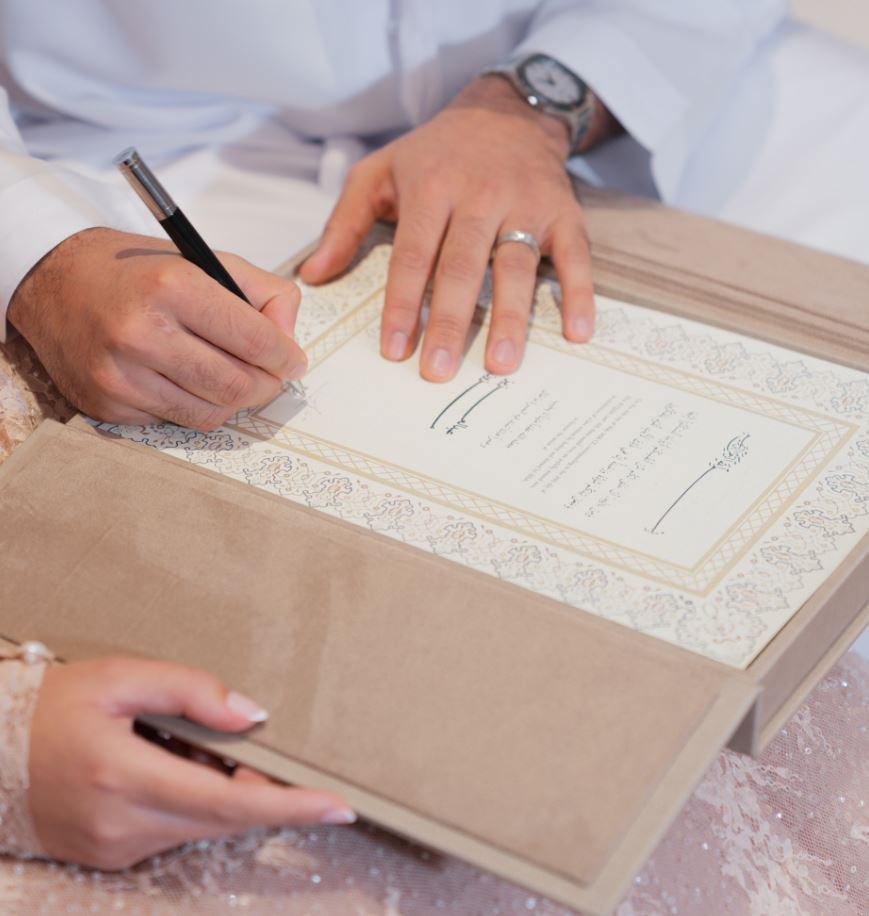 Signing the marriage contract at a Dubai wedding